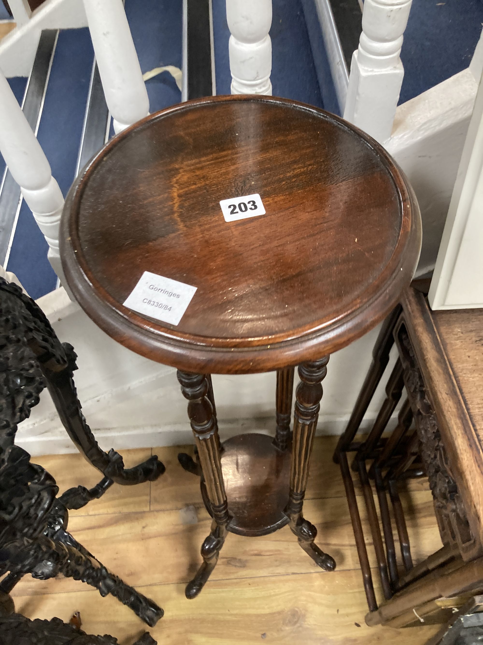 A mahogany two tier jardiniere stand, diameter 28cm height 100cm